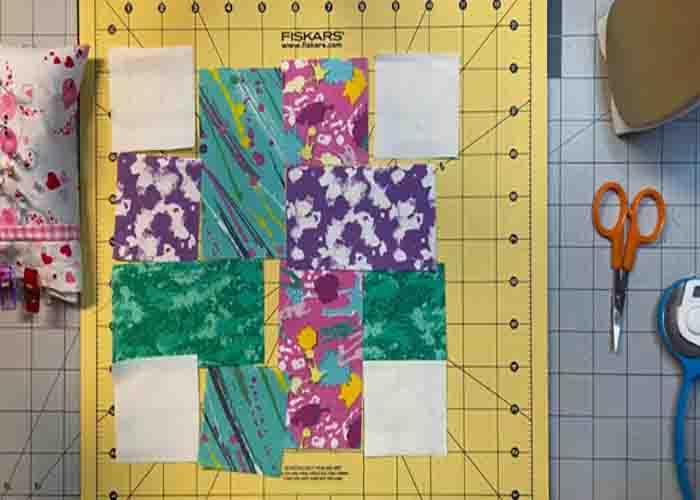 Laying out the dream weaver quilt block
