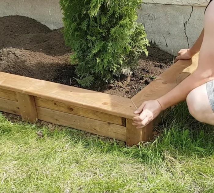 Make a DIY easy cheap garden bed edge anyone can do