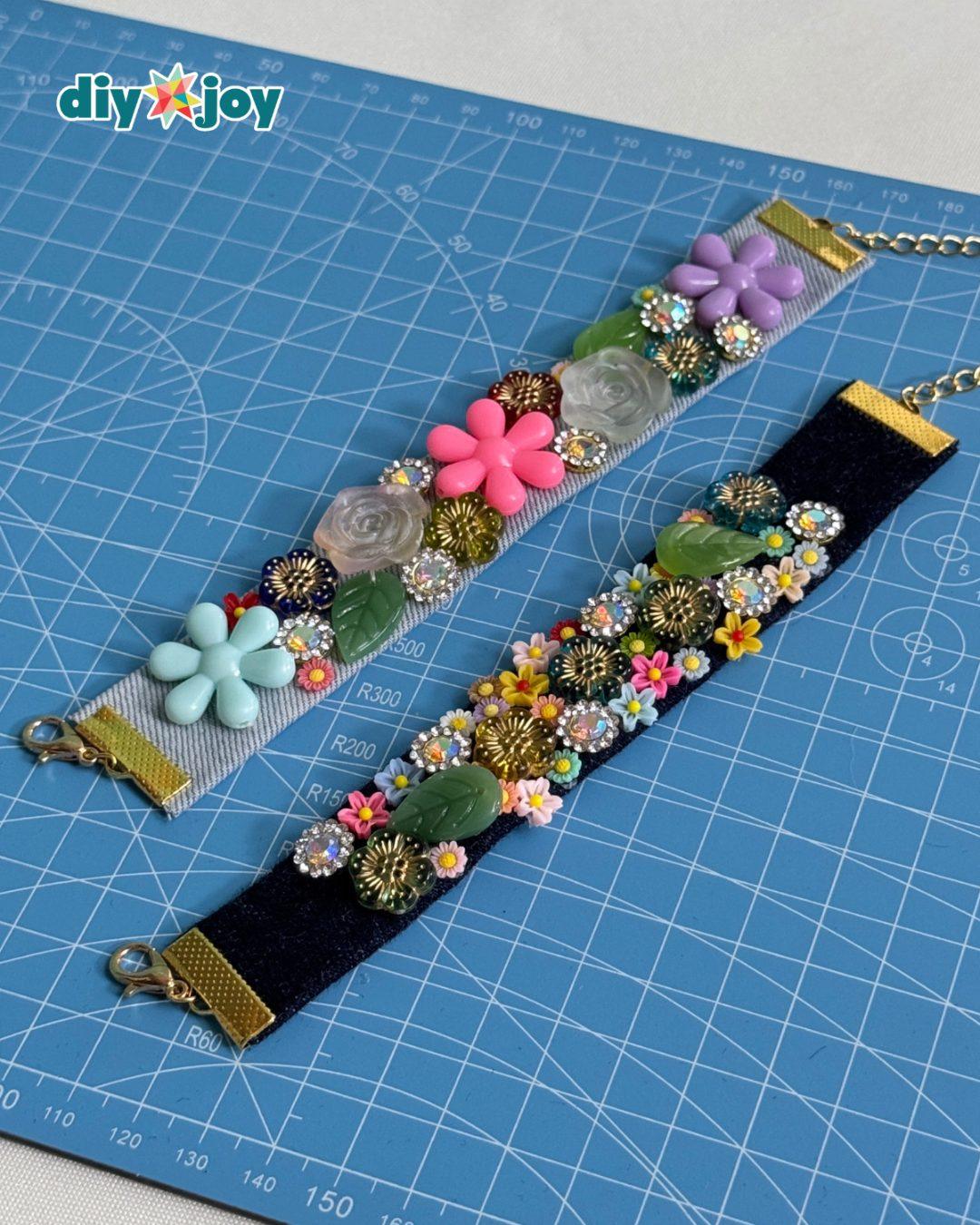Handmade denim flower bracelet using upcycled jeans, assorted beads, buttons, and a metal clasp
