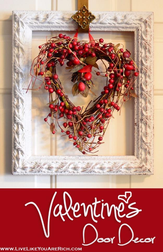 Front door decorated for Valentine's Day with red and pink hearts, an easy DIY Valentine decorating idea