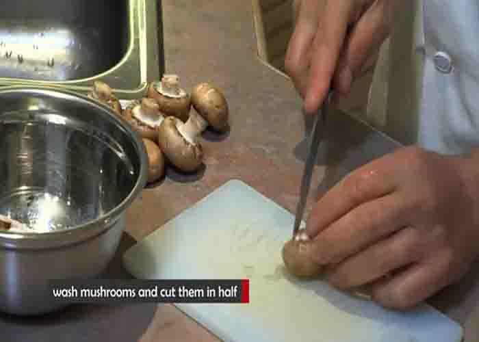 Chopping the mushrooms before frying