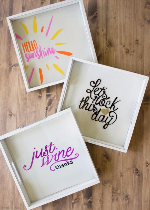 Custom wine tray and glasses, three white square trays lettered in pink and orange with hand drawn party slogans