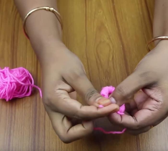 Make a DIY Peacock Yarn Vase