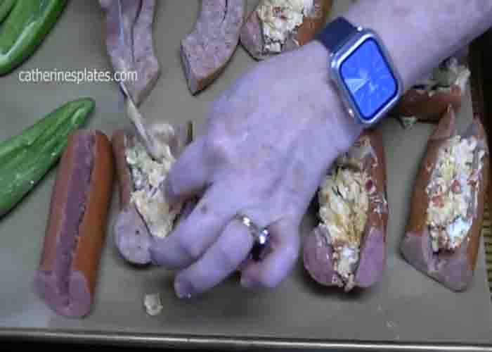 Filling the sausage with the cream cheese mixture