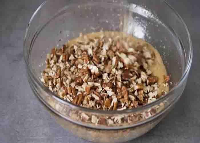 Making the pecan topping of the cheesecake bars