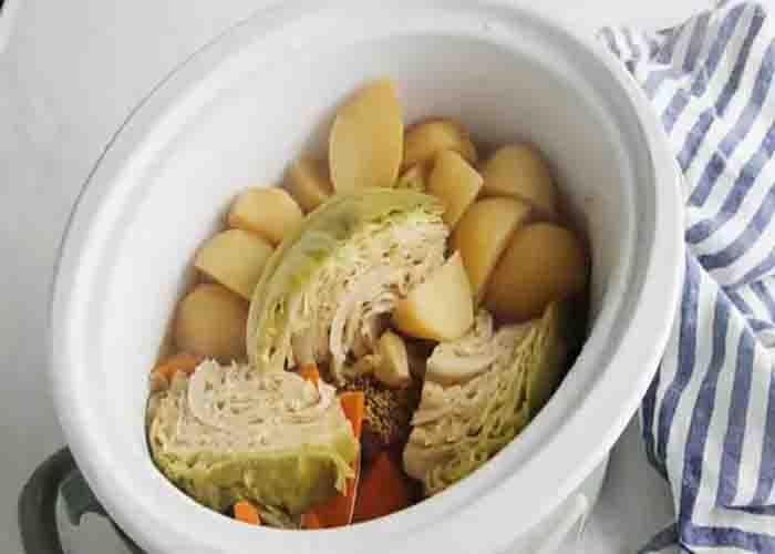 Slow cooking the corned beef and cabbage