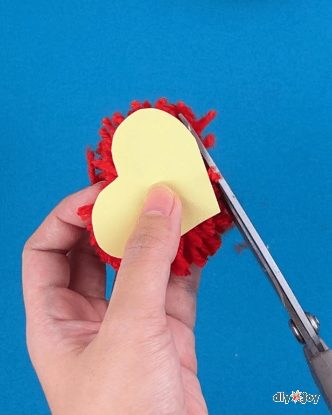 Homemade Pom Pom Hearts — how to make a heart pom pom