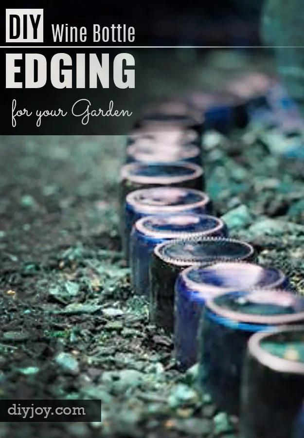 DIY curb appeal garden edging made from blue and green wine bottles buried upside down in a row along a gravel bed