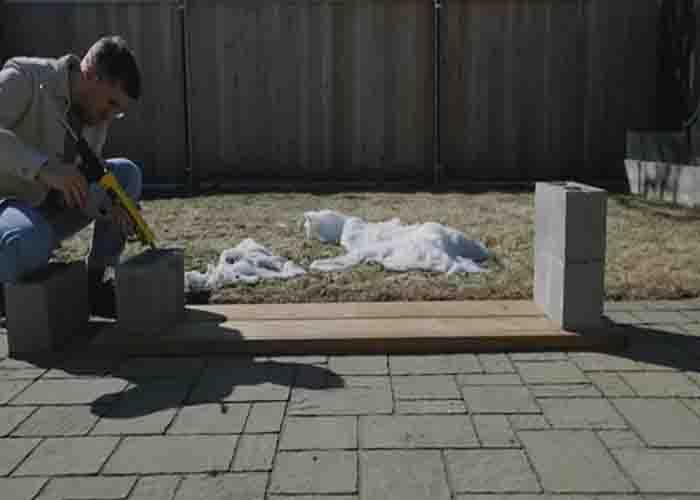 Gluing the concrete blocks to the boards