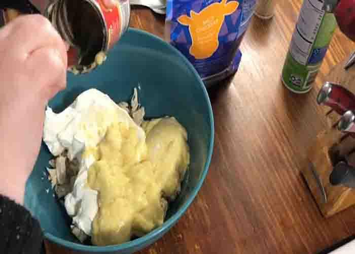 Combining all the ingredients for cracked out chicken tater tot