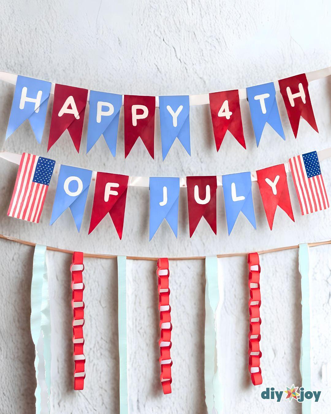 4th Of July Banner Toilet Paper Rolls — hanging the banner