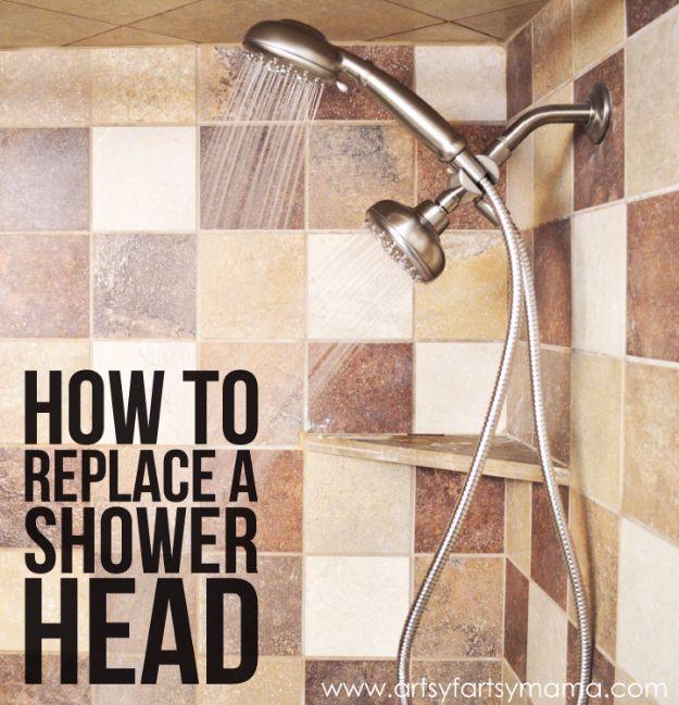 Replace a shower head, a brushed nickel dual shower head running water over multi-toned beige and brown tiled shower walls