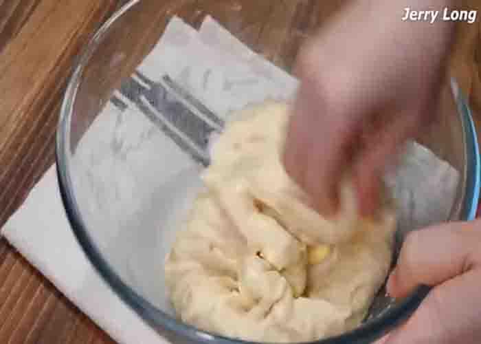 Kneading the milk bread dough before fermenting it.