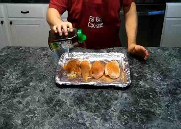 Seasoning the chicken for the chicken noodle casserole