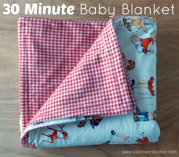 Thirty minute baby blanket graphic, a folded blanket with red gingham on one side and pale blue novelty print on the other