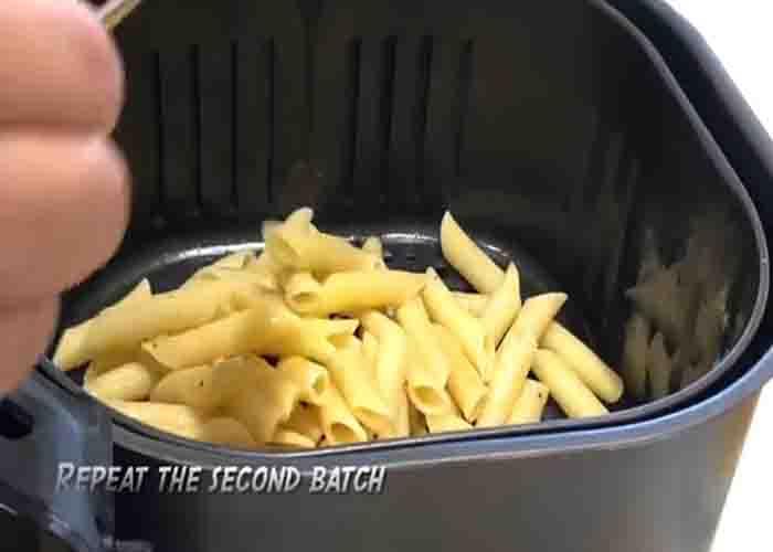 Air frying the seasoned pasta shells