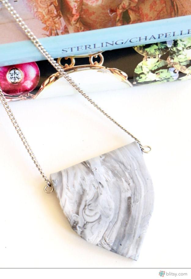 DIY Faux Marble Pendant, one of the best faux marble projects on this list and an affordable way to try something new