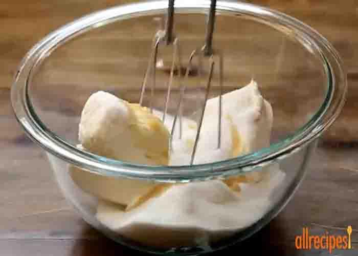 Whisking the cream cheese filling
