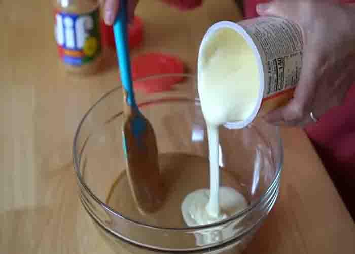 Combining the two ingredients for the peanut butter fudge