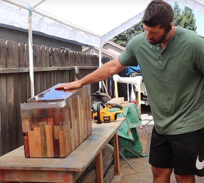 DIY bear sculpture from epoxy resin and wood