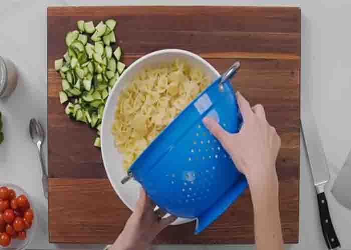 Building the Greek pasta salad