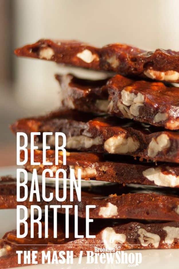 Graphic titled Beer Bacon Brittle showing shards of dark brittle studded with pecans stacked on a board