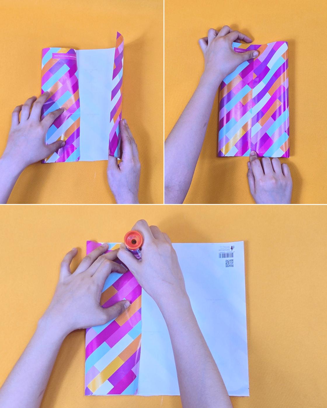 DIY Wrapping Paper - folding diagonal stripe paper edge to center and gluing the seam