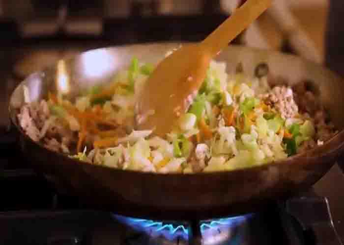 Making the meat filling for the egg rolls