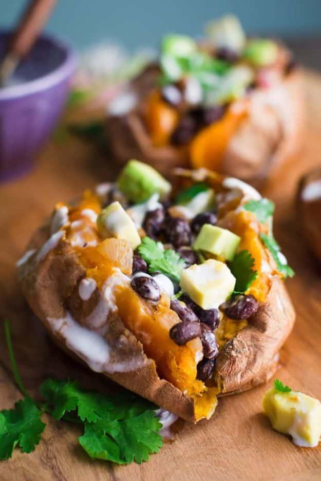 Easy dinner recipe: black bean stuffed sweet potatoes baked together for a hearty meatless dinner for the whole family