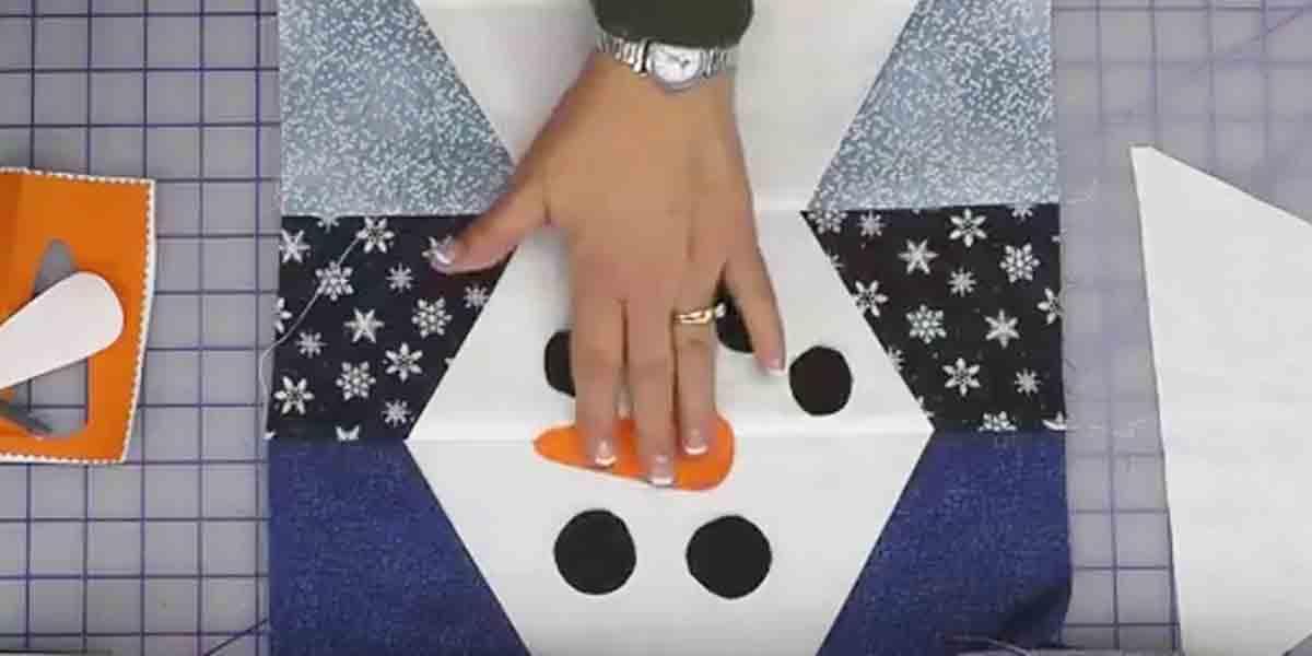 Make This Snowman Wall Hanging From Fabric Scraps