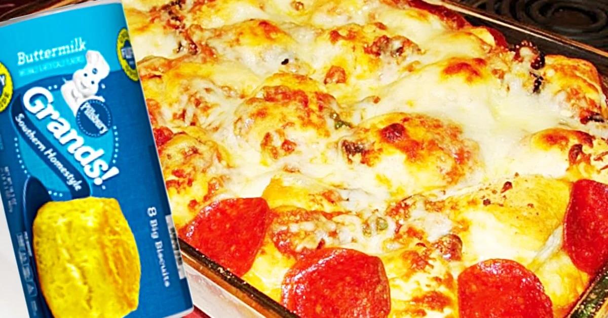 Bubble pizza casserole made from quartered canned buttermilk biscuits with pepperoni and melted mozzarella