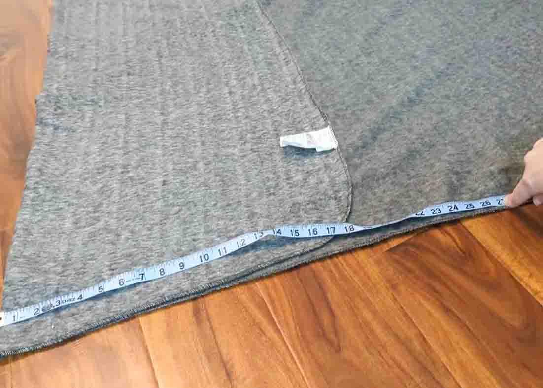 Measuring the fleece blanket to be made as a pillow bed