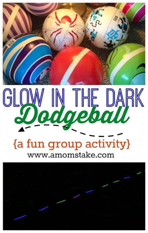 Glow in the dark dodgeball with plastic balls wrapped in glowing tape and glow sticks marking the line