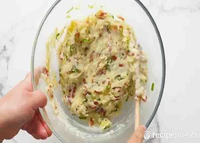 Making the potato filling of the jacket potatoes