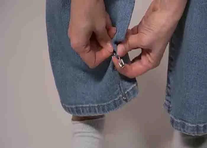 Marking the jeans with safety pins before tapering