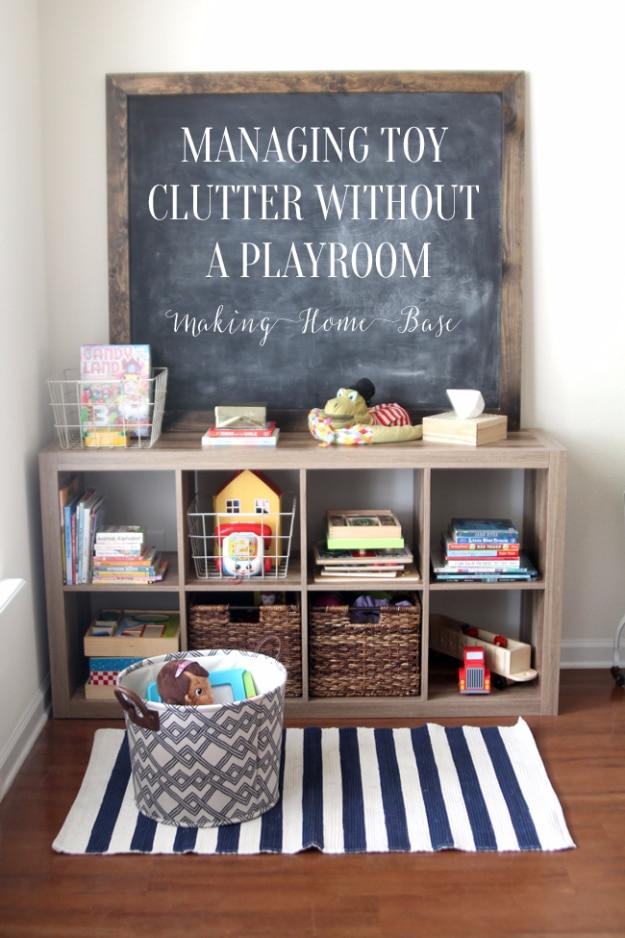Kids room toy organizing graphic, a weathered eight cube shelf of books and woven baskets under a large framed chalkboard