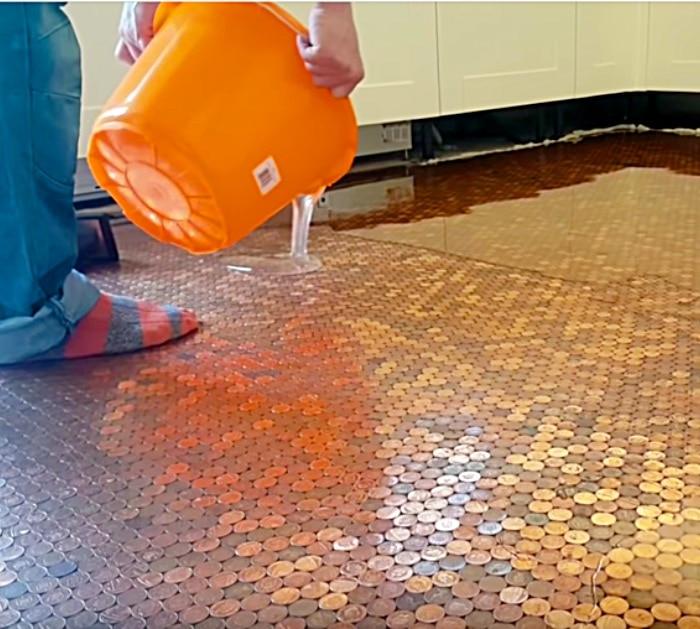 Try a new idea in the bathroom or kitchen by making an epoxy floor made with pennies