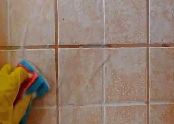 Rinsing your bathroom tiles with shower