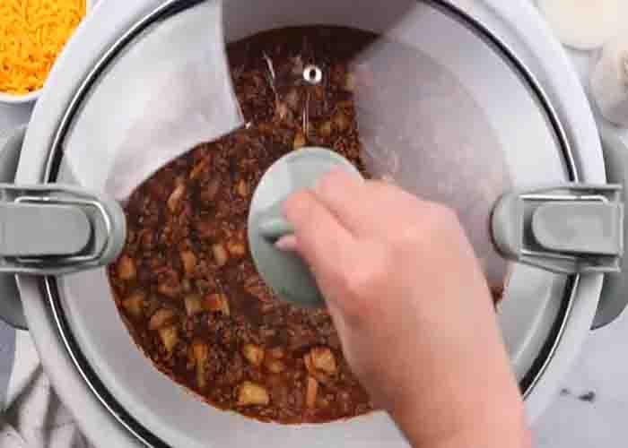 Cooking the Cincinnati chili in the slow cooker