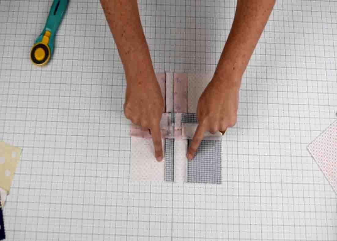 Pressing the seams of the disappearing four-patch quilt block