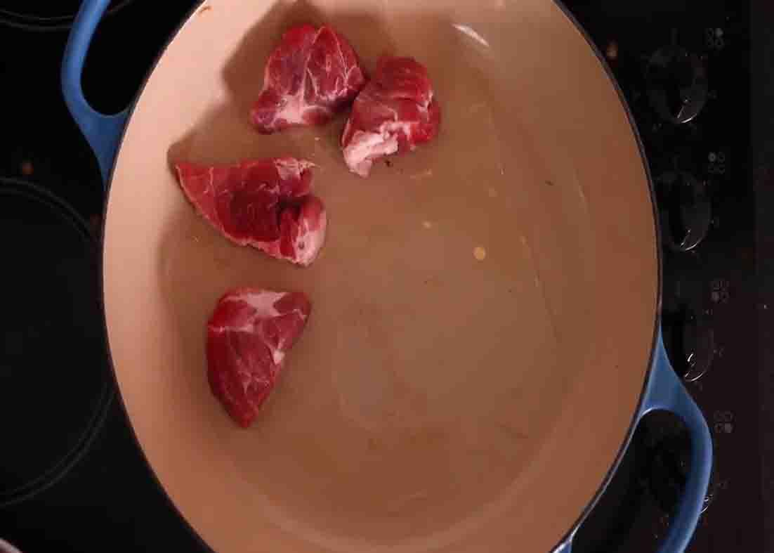 Sauteing the chopped pork
