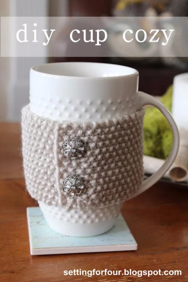 Knitted gift idea: a knit cup cozy slipped over a mug for an insulated handmade coffee lover gift for the whole family