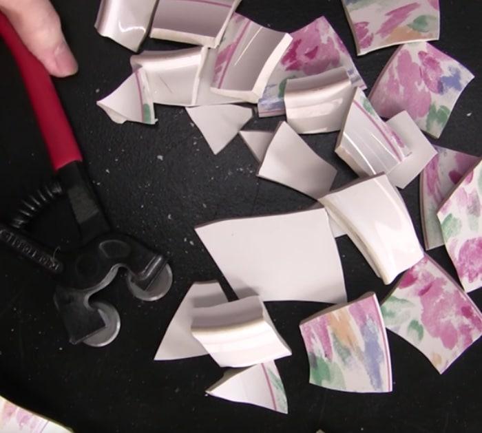 Make a mosaic stepping stone from an old plate