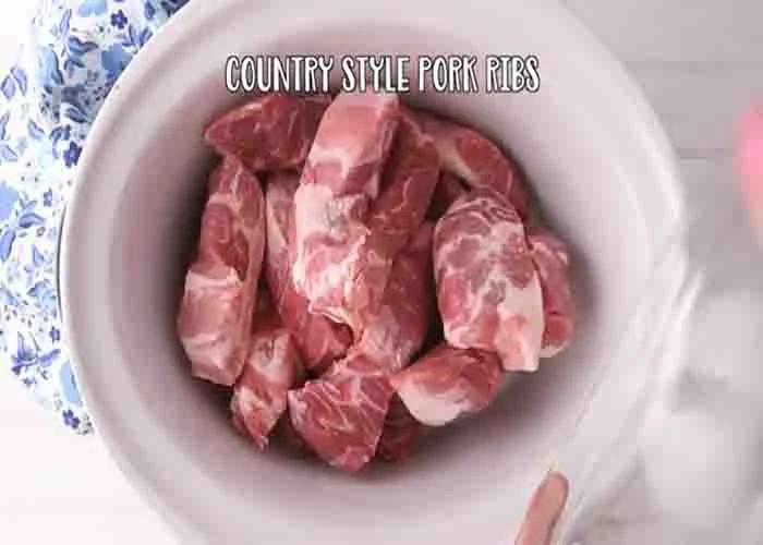 Adding the ribs to the crockpot