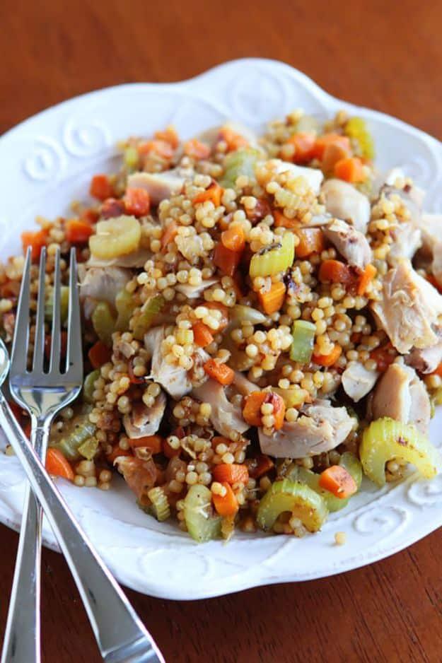 Chicken and couscous skillet dinner with caramelized onion and carrot in one pan, ready to serve for a quick weeknight meal