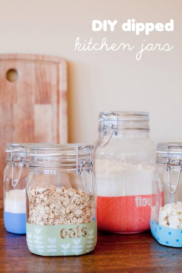 DIY dipped kitchen jars graphic, three clamp top jars of oats and flour with color blocked bases and lettered labels