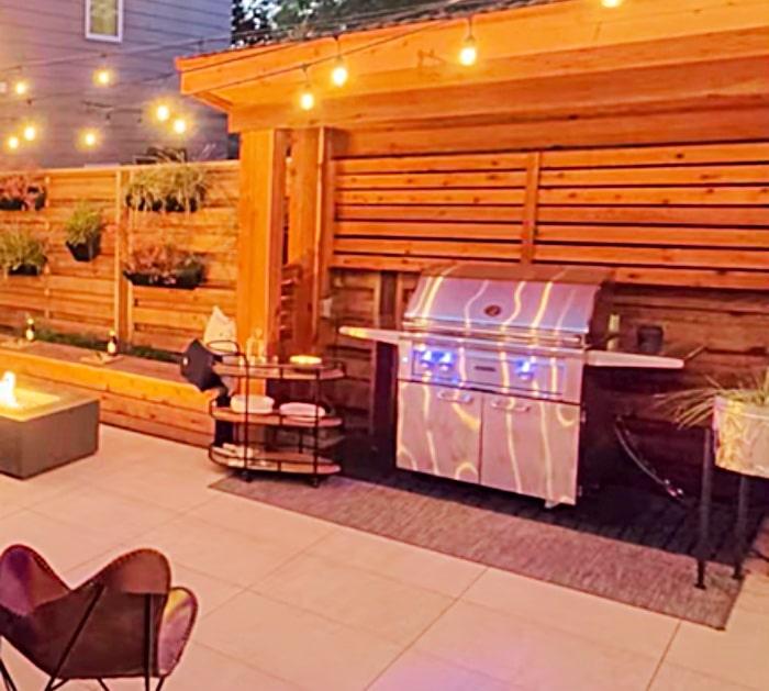 Make a privacy fence with a bar bq grotto