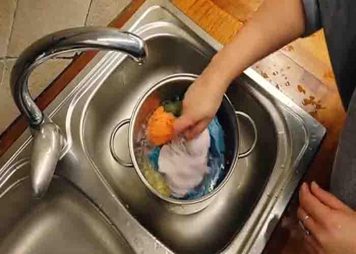 Rinsing the kitchen towels