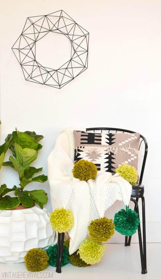 Giant Ombre Pom Pom Blanket, easy enough for a beginner to follow and a sweet little detail guests always notice