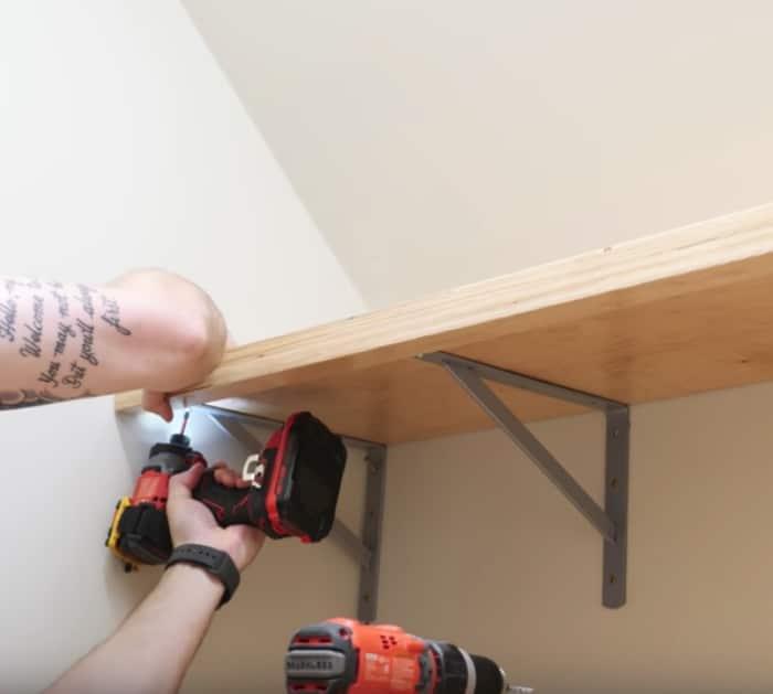 learn how to do a complete laundry room makeover with new shelves